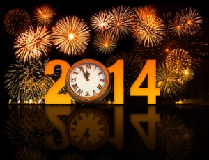 2014 year with fireworks and clock displaying 5 minutes before m